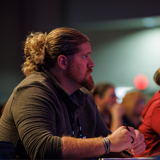 Man paying attention at the conference